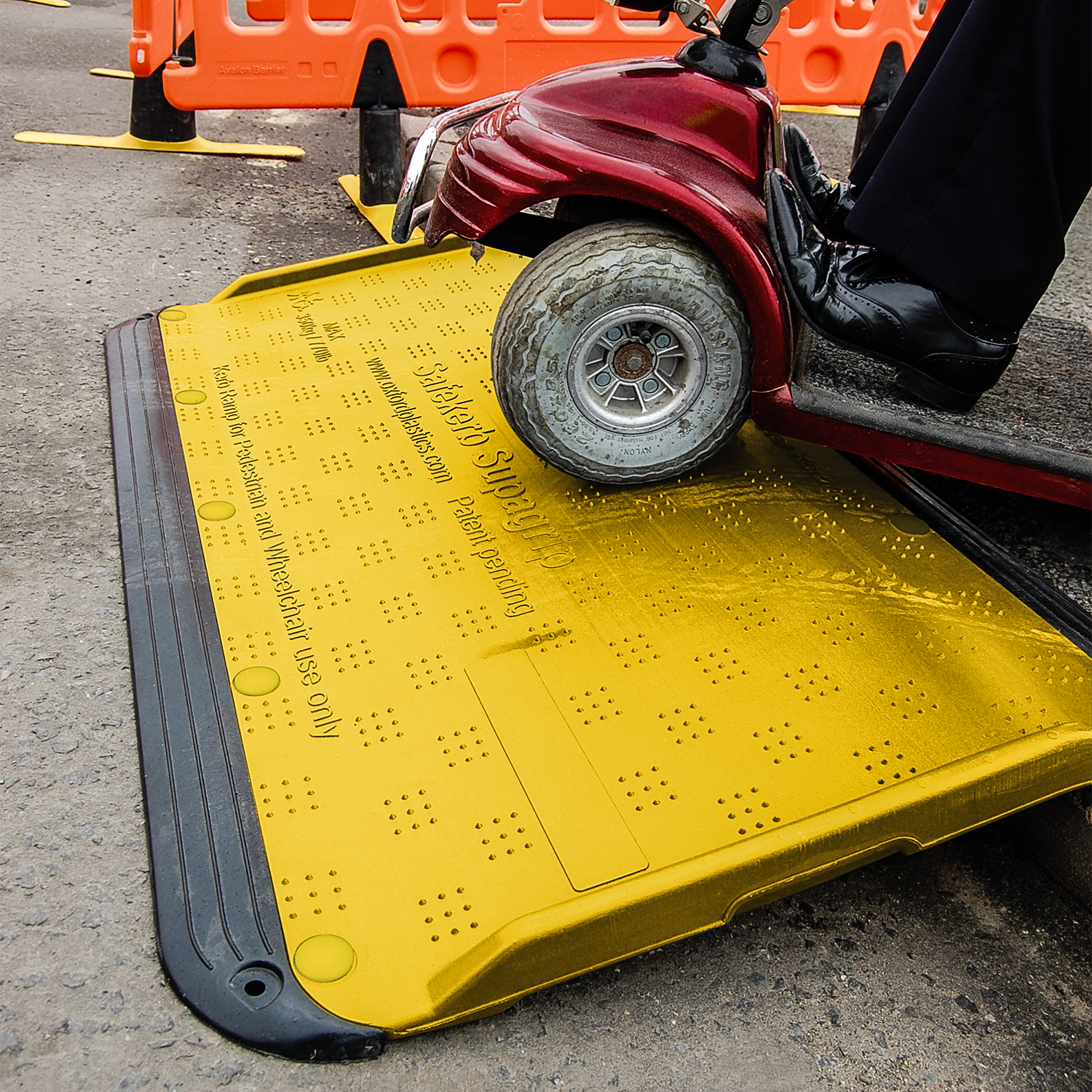 SafeKerb SupaGrip curb ramp installed on a sidewalk curb