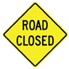 yellow road closed sign